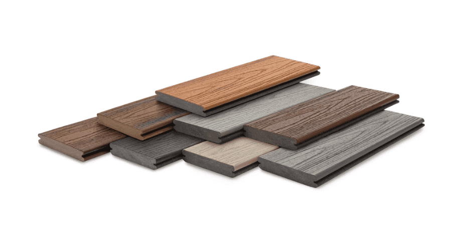 Stack of wooden planks in various shades of brown and gray, arranged on a white background.